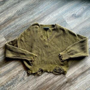 Grunge v-neck olive green sweater with distressed sleeves